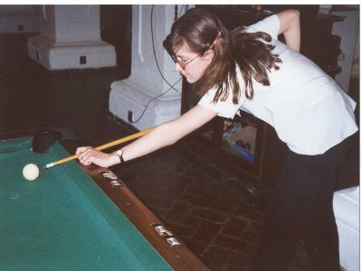 A girl of great skill in pool